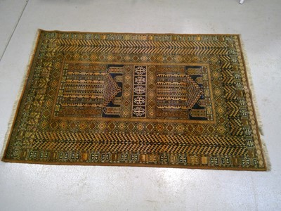 Lot 26 - A Louise de Poortere Samarkand Rug. The Rug is...