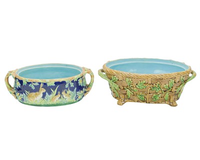 Lot 505 - Two majolica tureen bases.