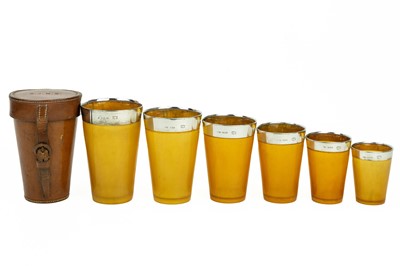 Lot 299 - Asprey silver mounted horn nesting beakers.