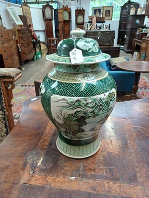 Lot 381 - A Famille Verte baluster vase and cover.