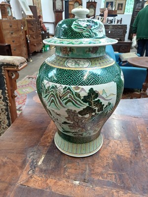Lot 381 - A Famille Verte baluster vase and cover.