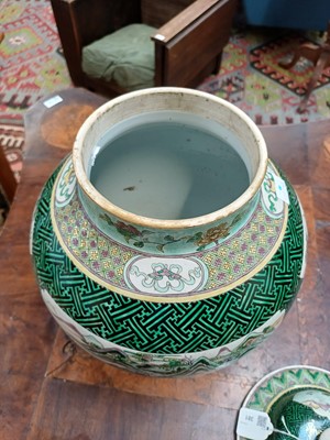 Lot 381 - A Famille Verte baluster vase and cover.