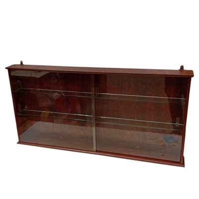 Lot 127 - A wooden display cabinet with four glass...
