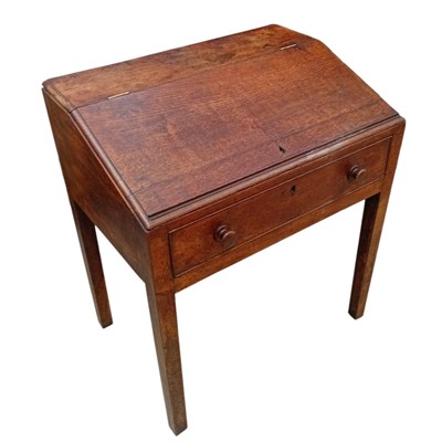 Lot 131 - A Victorian oak clerk's desk. 55 x 65 x 85cm...