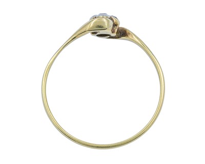 Lot 63 - An 18k diamond set four stone ring.