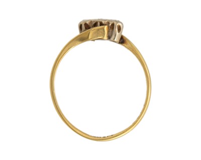 Lot 91 - An 18k and platinum diamond set three stone ring.