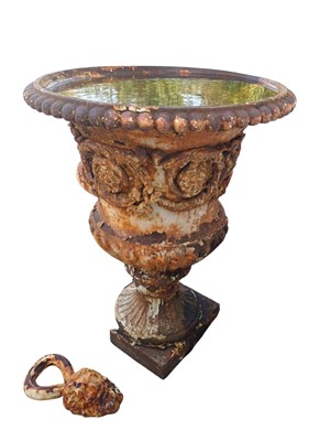 Lot 828 - A substantial cast iron garden urn.