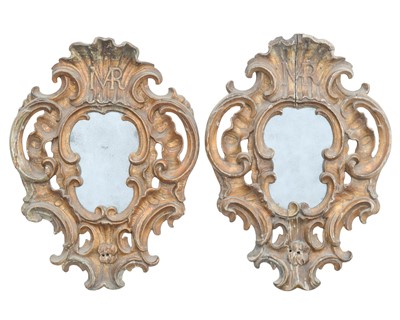 Lot 791 - A pair of Italian baroque gilt wood small wall mirrors.