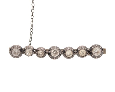 Lot 93 - A 19th-century cushion cut white paste set silver necklace, and a paste set brooch.
