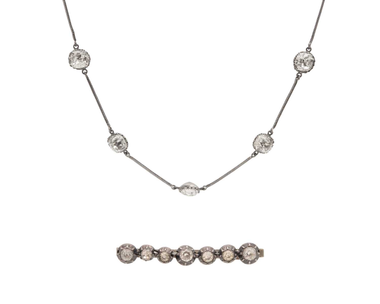 Lot 93 - A 19th-century cushion cut white paste set silver necklace, and a paste set brooch.