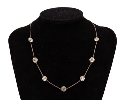 Lot 93 - A 19th-century cushion cut white paste set silver necklace, and a paste set brooch.