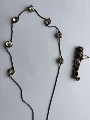 Lot 93 - A 19th-century cushion cut white paste set silver necklace, and a paste set brooch.