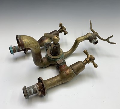 Lot 169 - A heavy brass Shanks mixer tap. Height 37.5cm.