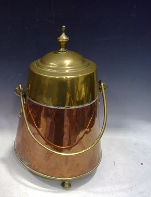 Lot 176 - A Copper and Brass Doofpot. The piece is 46cm...