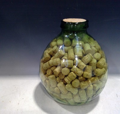 Lot 195 - A Carboy of Corks, 40cm tall and 30cm in...