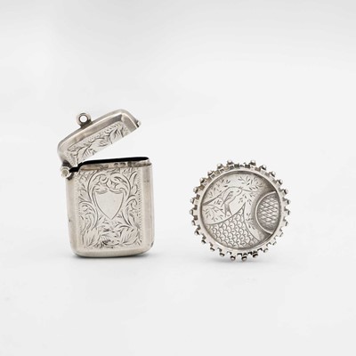 Lot 104 - An Edwardian silver vesta case, and a Victorian silver brooch.