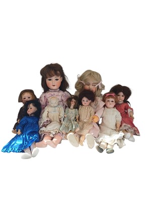 Lot 224 - A collection of early 20th century dolls.