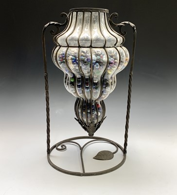 Lot 128 - An unusual blown glass and wrought metal...