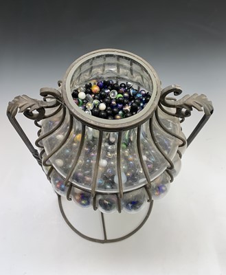 Lot 128 - An unusual blown glass and wrought metal...