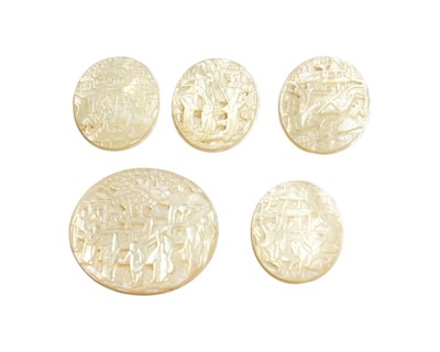 Lot 437 - A group of five Chinese carved mother of pearl oval plaques.
