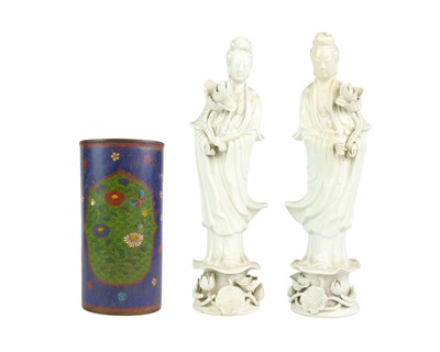 Lot 417 - A pair of Chinese blanc de chine figures of Guanyin.