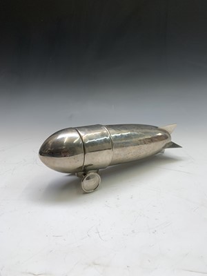 Lot 223 - An Art Deco style cocktail shaker in the form...