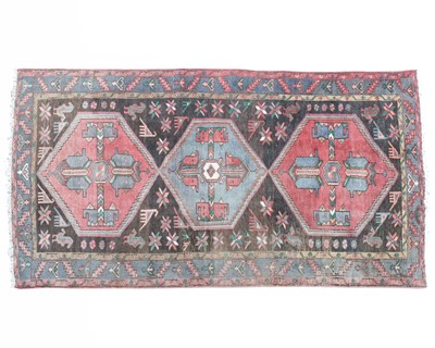 Lot 454 - An Iranian wool rug.
