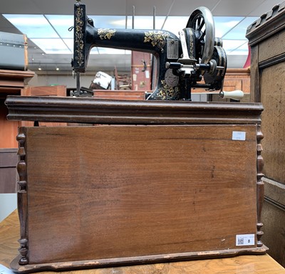 Lot 8 - A hand crank sewing machine by Winselmann, in...