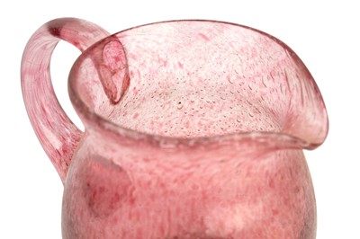 Lot 645 - A Scottish ruby coloured bubble glass lemonade jug.