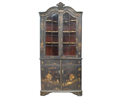 Lot 908 - A Japanned black lacquer standing corner cabinet.