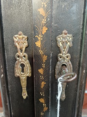 Lot 908 - A Japanned black lacquer standing corner cabinet.