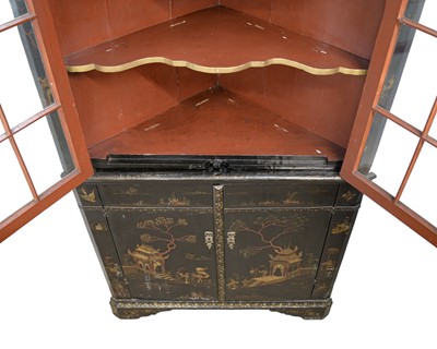 Lot 908 - A Japanned black lacquer standing corner cabinet.