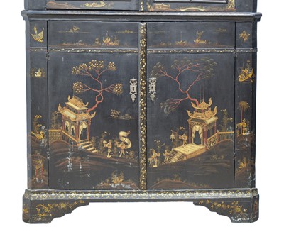 Lot 908 - A Japanned black lacquer standing corner cabinet.