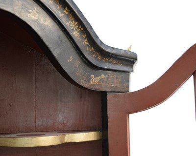 Lot 908 - A Japanned black lacquer standing corner cabinet.