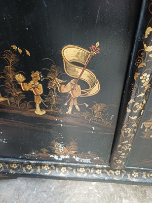 Lot 908 - A Japanned black lacquer standing corner cabinet.