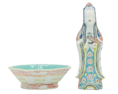 Lot 414 - A Chinese polychrome figure of Guanyin.