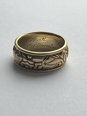 Lot 24 - A Good George IV high-purity gold band ring with carved decoration, with inscription dated 1824.