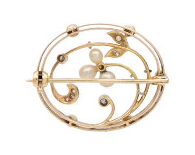 Lot 49 - A Belle Epoque diamond and seed pearl set gold and platinum open-work brooch.