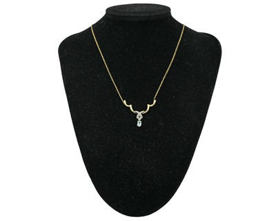 Lot 69 - A 9k blue topaz and diamond set pendant necklace.