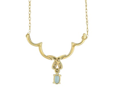 Lot 69 - A 9k blue topaz and diamond set pendant necklace.