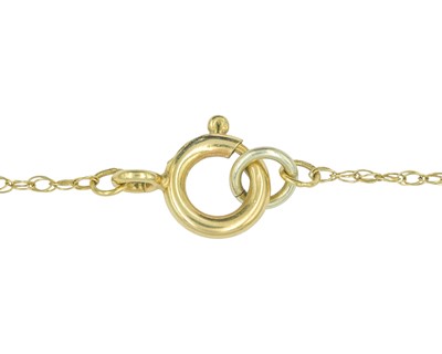 Lot 69 - A 9k blue topaz and diamond set pendant necklace.