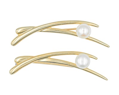 Lot 73 - A pair of modern 9k hallmarked cultured pearl set brooches.