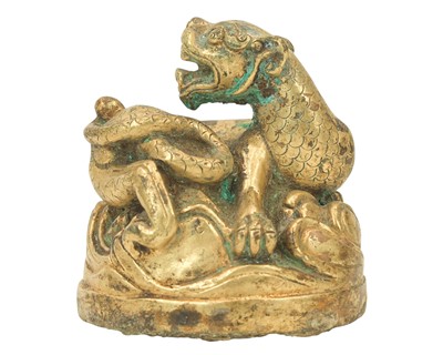 Lot 393 - A Chinese gilt bronze scroll weight.
