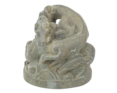 Lot 424 - A small Chinese bronze group of fighting dragons.