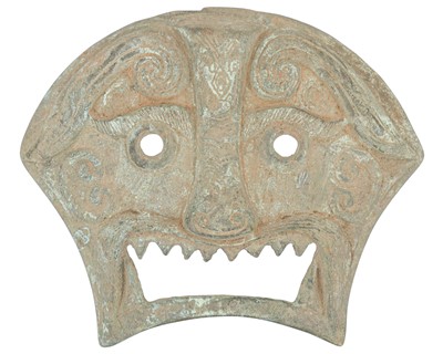 Lot 433 - A Chinese bronze buckle mask.