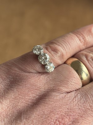 Lot 95 - A good 18k white gold 2.60ct diamond set three-stone ring.