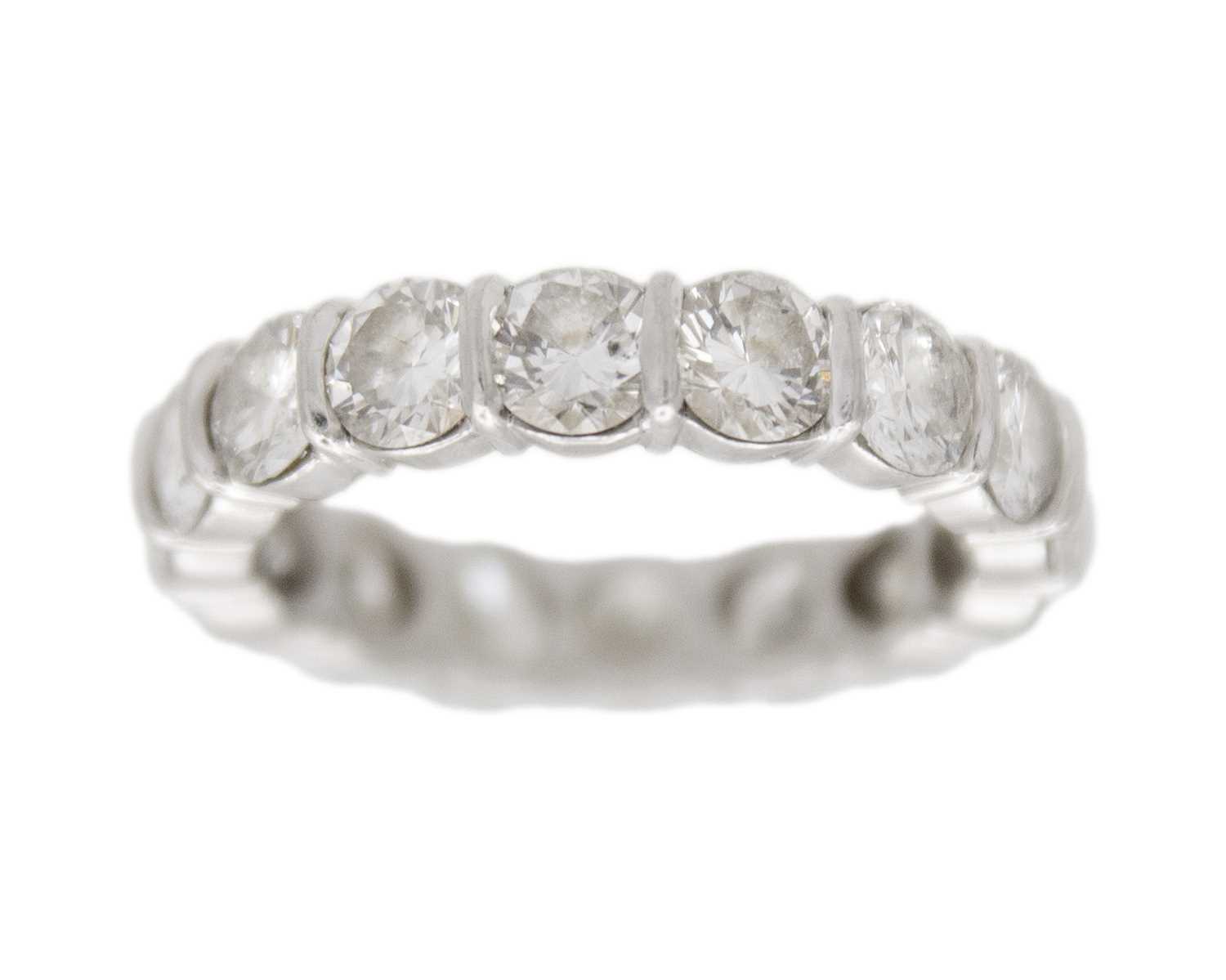Lot 96 - A good platinum 4.00ct diamond set full eternity ring.