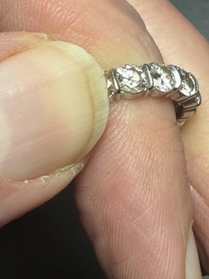 Lot 96 - A good platinum 4.00ct diamond set full eternity ring.