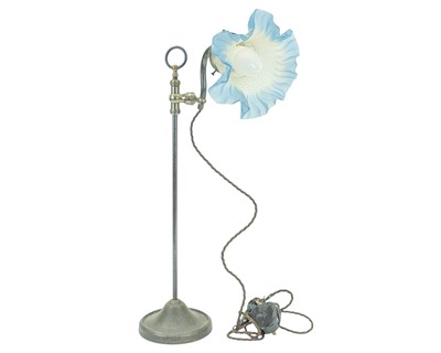 Lot 783 - A rise and fall table lamp.
