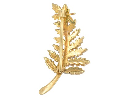 Lot 84 - A 9k hallmarked gold pearl set, fern leaf design brooch by Cropp & Farr.